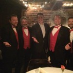A quartet sings for Governor Cuomo